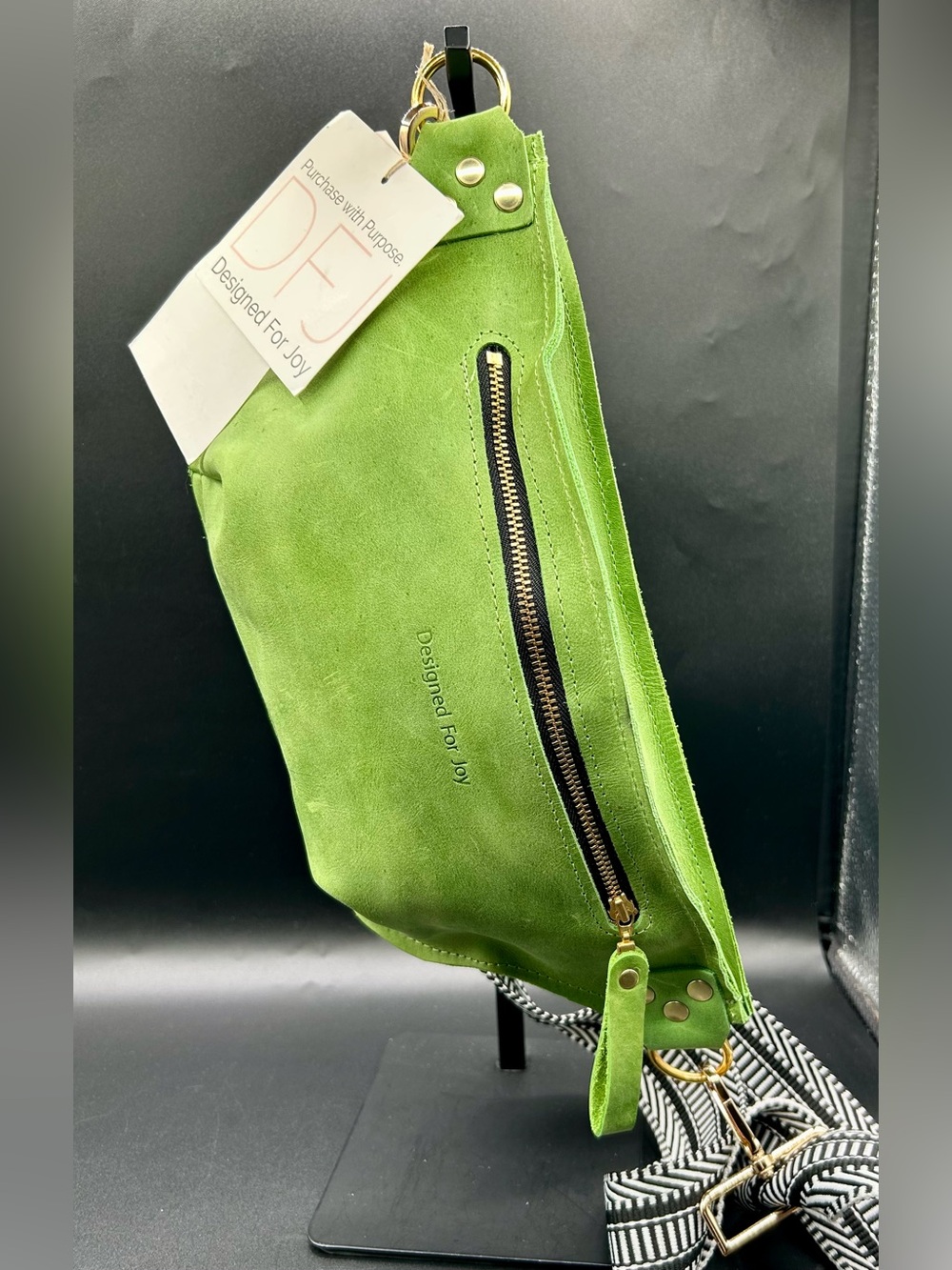 DESIGNED FOR JOY Rosie Leather Convertible Belt Bag in Green.